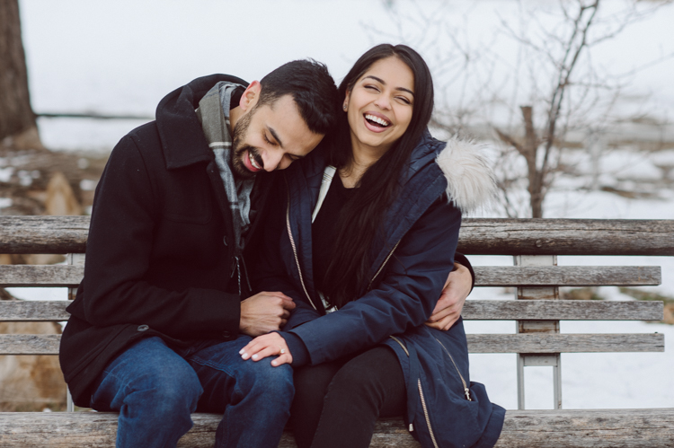 Gantry Plaza State Park LIC, Jay proposed to his girlfriend Aditi the day before valentines day on February 13, 2021 and coldest day! Aditi and Jay met during school while they were studying for MBA at NYU. Proposal totally caught Aditi by surprise, Jay fell on one knee on the edge of Gantry Plaza State Park LIC pulled out the most beautiful diamond ring. With excitement and over joyed hearts, as fiancés we waked around Gantry Plaza State Park to Queens Public Library for quick portraits of the lovers before sending them away for their engagement celebration. Aditi and Jay's Gantry Plaza State Park LIC proposal photograph captured by Hey Karis documenting elopements and weddings in NY NJ and planet earth.